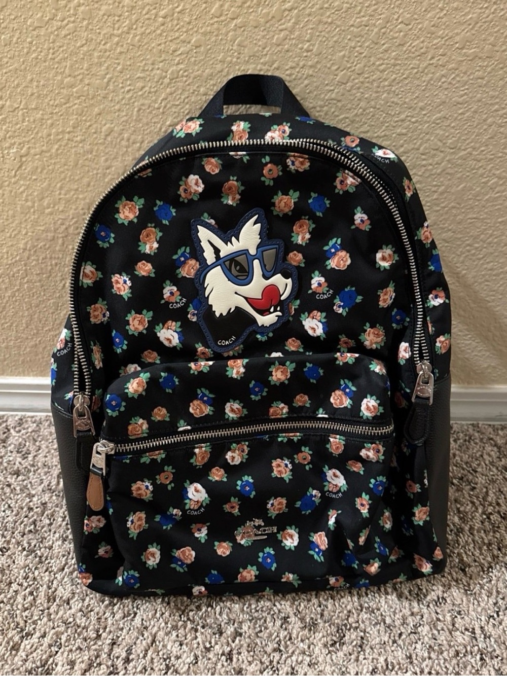 Coach Black Floral Backpack with Wolf Patch